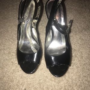 Black leather and wooden high heels